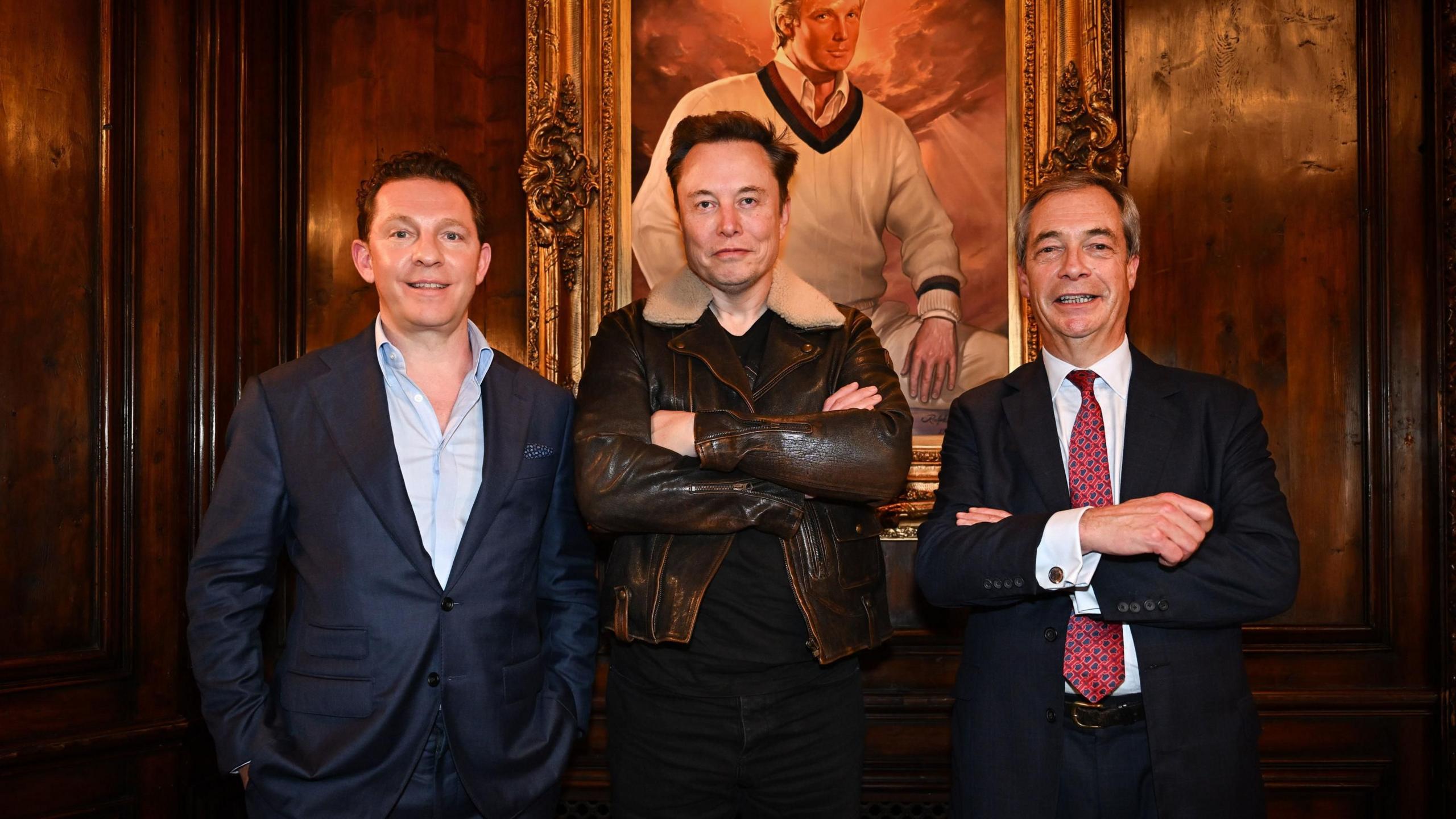 Nick Candy and Nigel Farage, from Reform UK, stand with billionaire Elon Musk in front of a portrait of Donald Trump