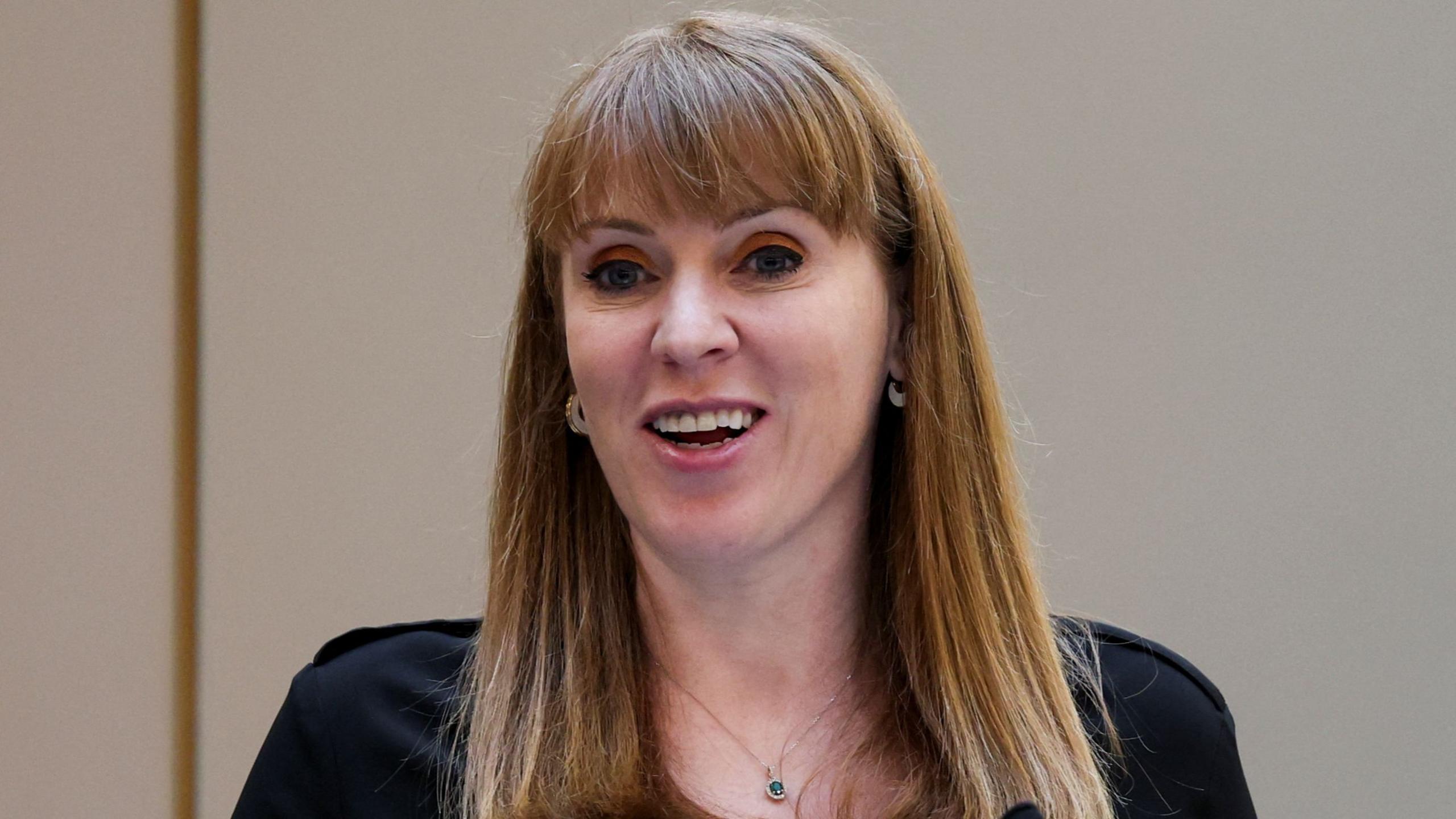 Angela Rayner giving a speech in Leeds