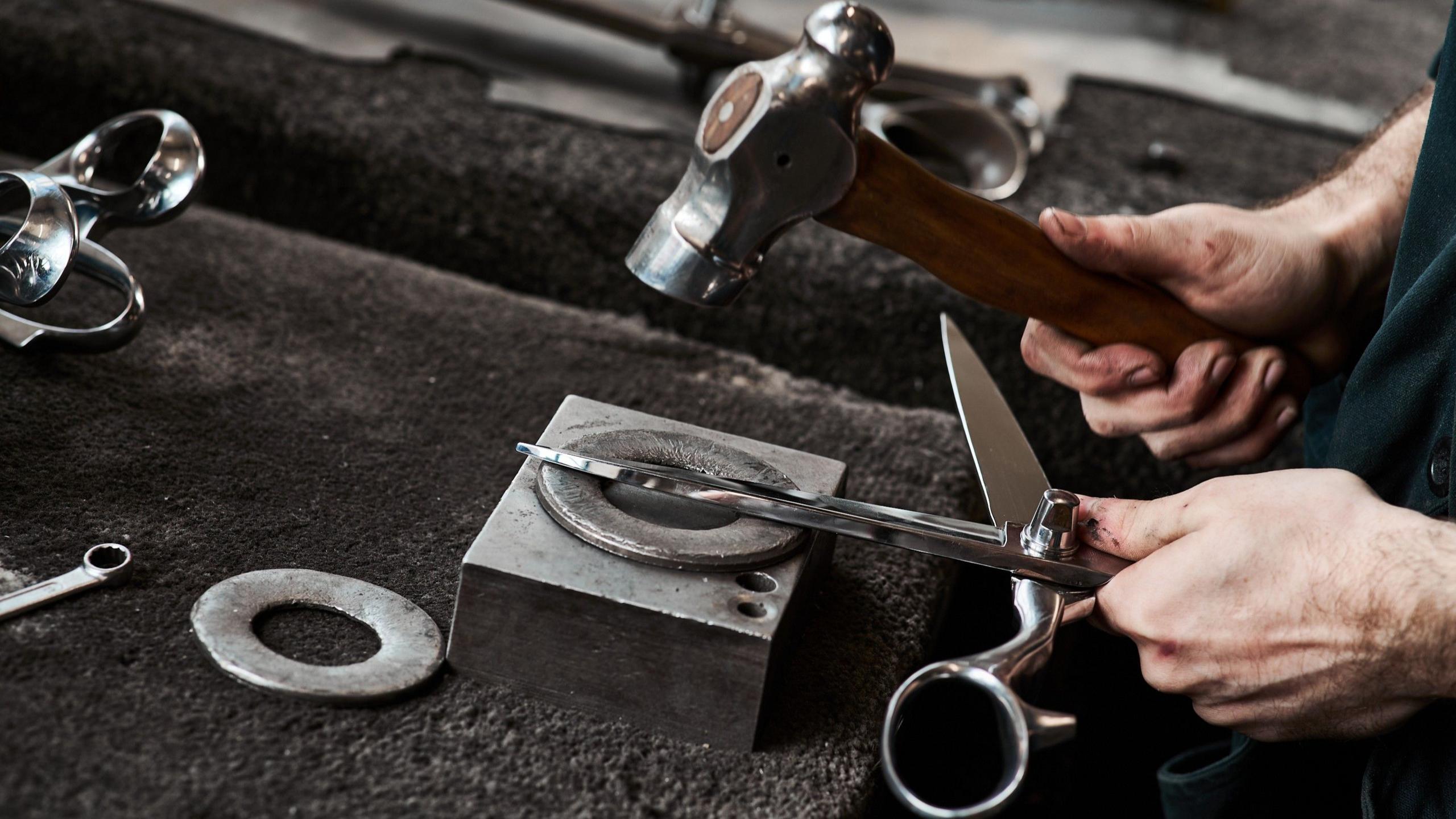 A worker at Ernest Wright puts finishing touches to a pair of shears.