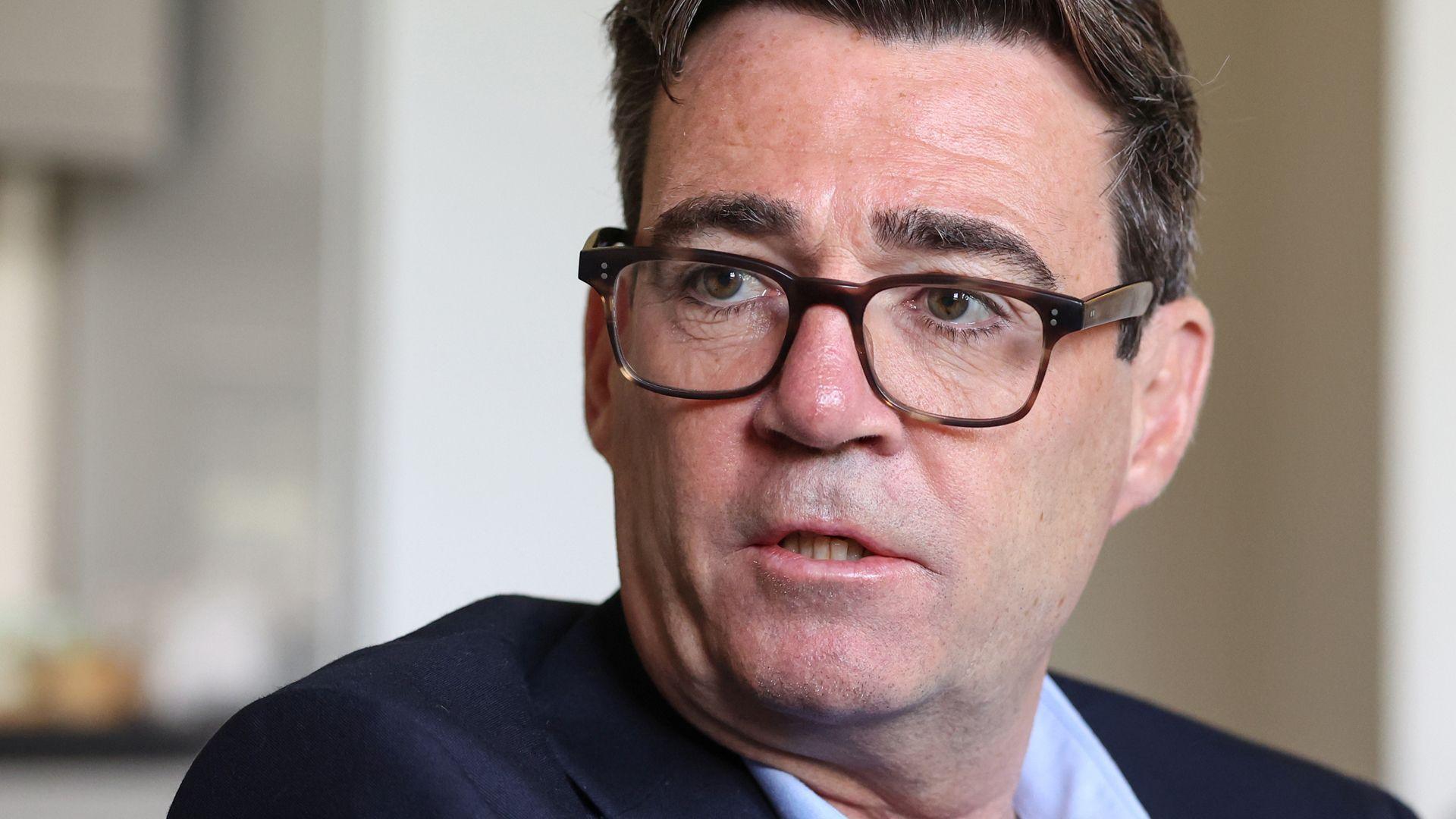 Britain's Prime Minister Andy Burnham speaks with staff and residents as he pays a visit to the homelessness charity Changing Lives on August 19, 2026 in Newcastle, England. 